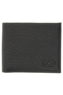 Black textured leather Ferragamo men’s Gancini wallet with embossed logo front view