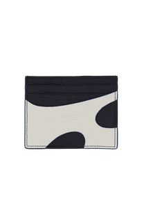 Ferragamo men’s leather card holder in black and off-white cow-print with stitched edges