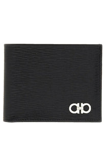 Ferragamo men’s black leather wallet with textured surface and silver-toned logo emblem on lower right corner
