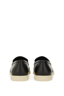 Ferragamo men’s moccasin gancini black leather loafers with cream-colored rubber sole for stylish comfort