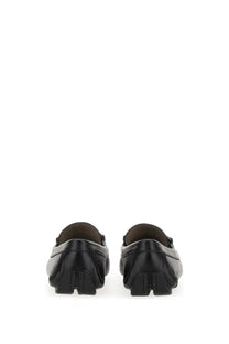 Ferragamo men’s moccasin gancini black leather loafers with glossy finish and contrasting textured side panels