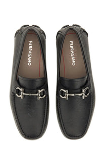 Ferragamo men’s moccasin gancini black leather loafers with silver horsebit detailing on the front