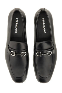 Ferragamo men’s moccasin gancini black leather loafers with silver horsebit buckle and ferragamo logo on the insole