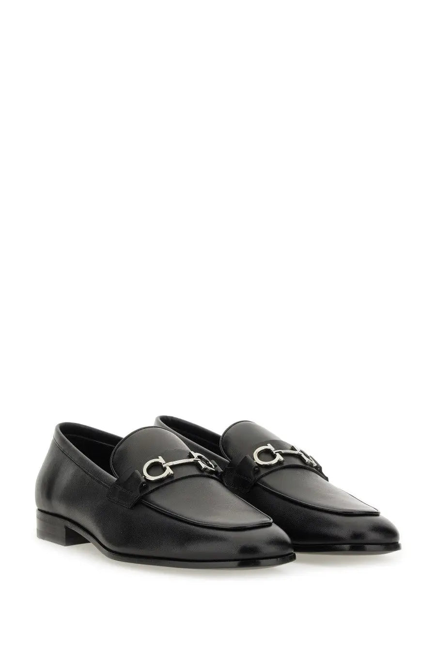 Black leather ferragamo men’s moccasin with silver gancini horsebit buckle for formal wear