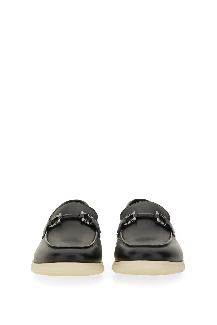 Ferragamo men’s moccasin black leather loafers with silver horsebit buckle and cream rubber soles
