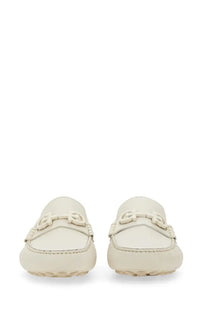 Cream-colored leather Ferragamo men’s moccasin with g-shaped metal buckle and braided detailing