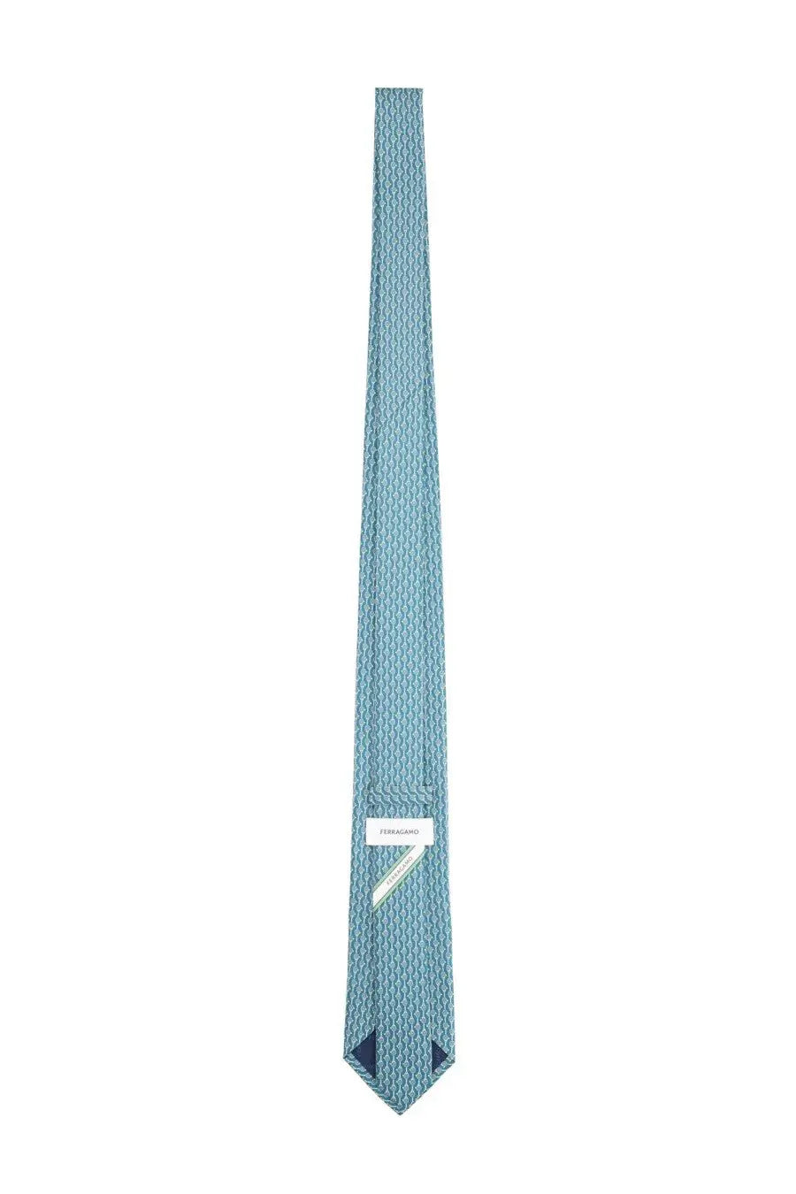 Ferragamo men’s silk tie in light blue with a subtle geometric pattern and white label at the collar end