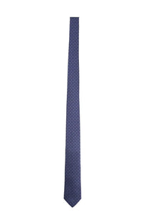 A navy blue Ferragamo men’s silk tie with a subtle repeating geometric pattern in lighter shades