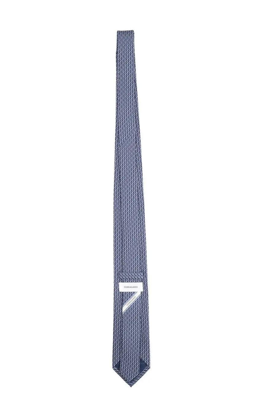 A navy blue silk tie with a subtle geometric pattern and ferragamo brand label at the base
