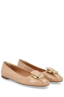 Beige patent leather Ferragamo women’s ballerina flats with gold-tone Gancini buckle detail