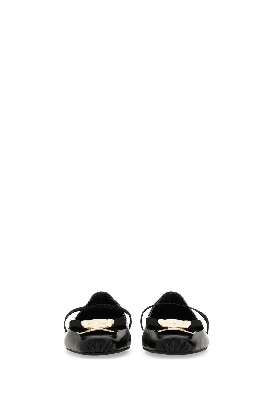 Ferragamo women’s dancer zina black patent leather loafers with gold-tone bow accent front view