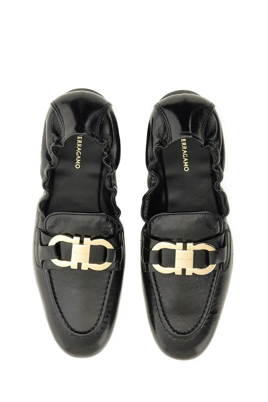 Ferragamo women’s deconstructed loafer black patent leather with gold-tone double f logo buckle on top
