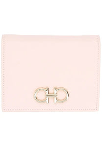 Ferragamo women’s pale pink leather wallet with silver-toned double g buckle clasp for stylish organization