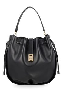 Ferragamo women’s hug bucket bag in black leather with gold-tone hardware and drawstring closure