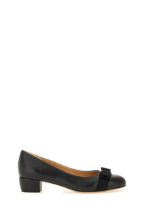 Ferragamo women’s leather vara shoe black patent leather pump with contrasting black fabric bow at the toe