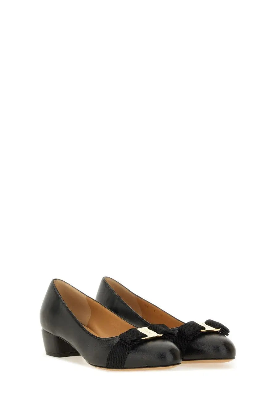 Ferragamo women’s black patent leather pumps with gold-tone buckle and black satin bow at the toe