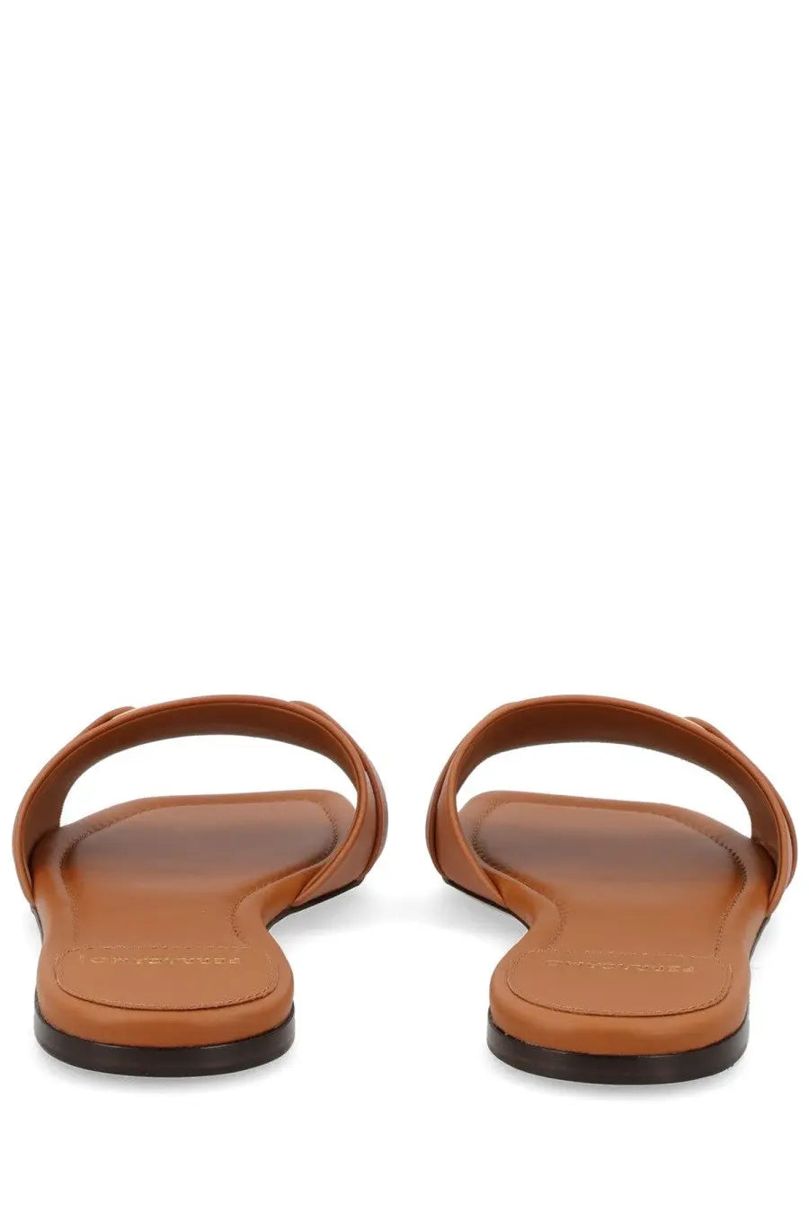 Ferragamo women’s slide gancini beige brown leather sandals with minimalist design and black rubber soles