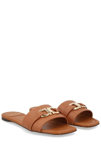 Ferragamo women’s slide gancini beige tan leather sandals with gold-tone metal buckle featuring interlocking h design