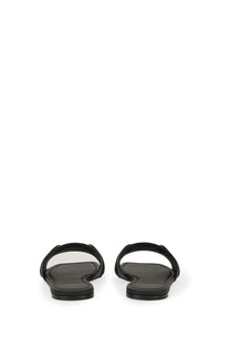 Ferragamo women’s slide sandal in black leather with minimalist design and transparent insole