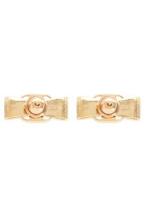 Ferragamo women’s gold tone metal bow cufflinks with polished finish and engraved made in italy inscription