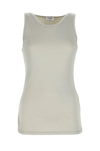 A soft ribbed beige sleeveless top by Filippa K featuring thin ribbed material for a sleek fit