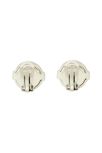 Silver-toned circular clip-on earrings with polished metallic finish and subtle engraved detailing by fiorucci women