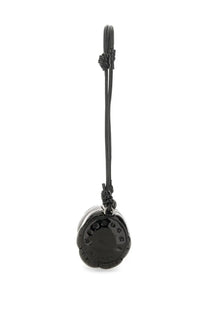 Black glossy leather phone charm with circular textured design and braided cord for fiorucci women shoulder bag mella black
