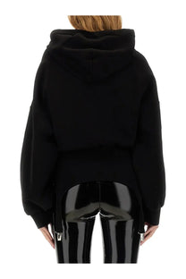 Fiorucci women’s black cropped hoodie with high low hemline and attached side straps in soft sweatshirt material