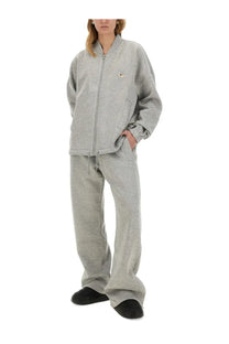 Gray heathered fleece tracksuit set with small embroidered logo on left chest by fiorucci women
