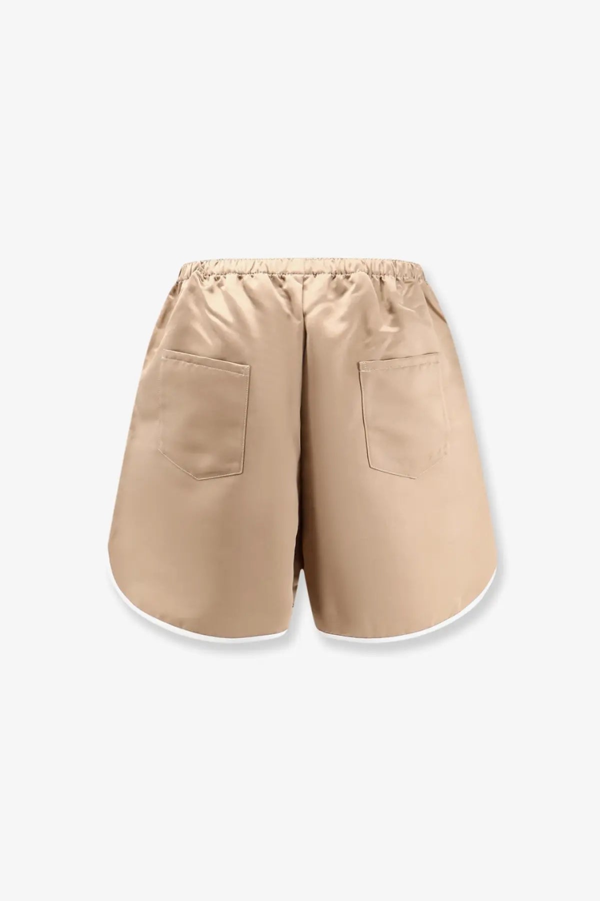 Beige satin boxer shorts with elastic waistband and white trim along the hem from the frankie shop women’s adia collection