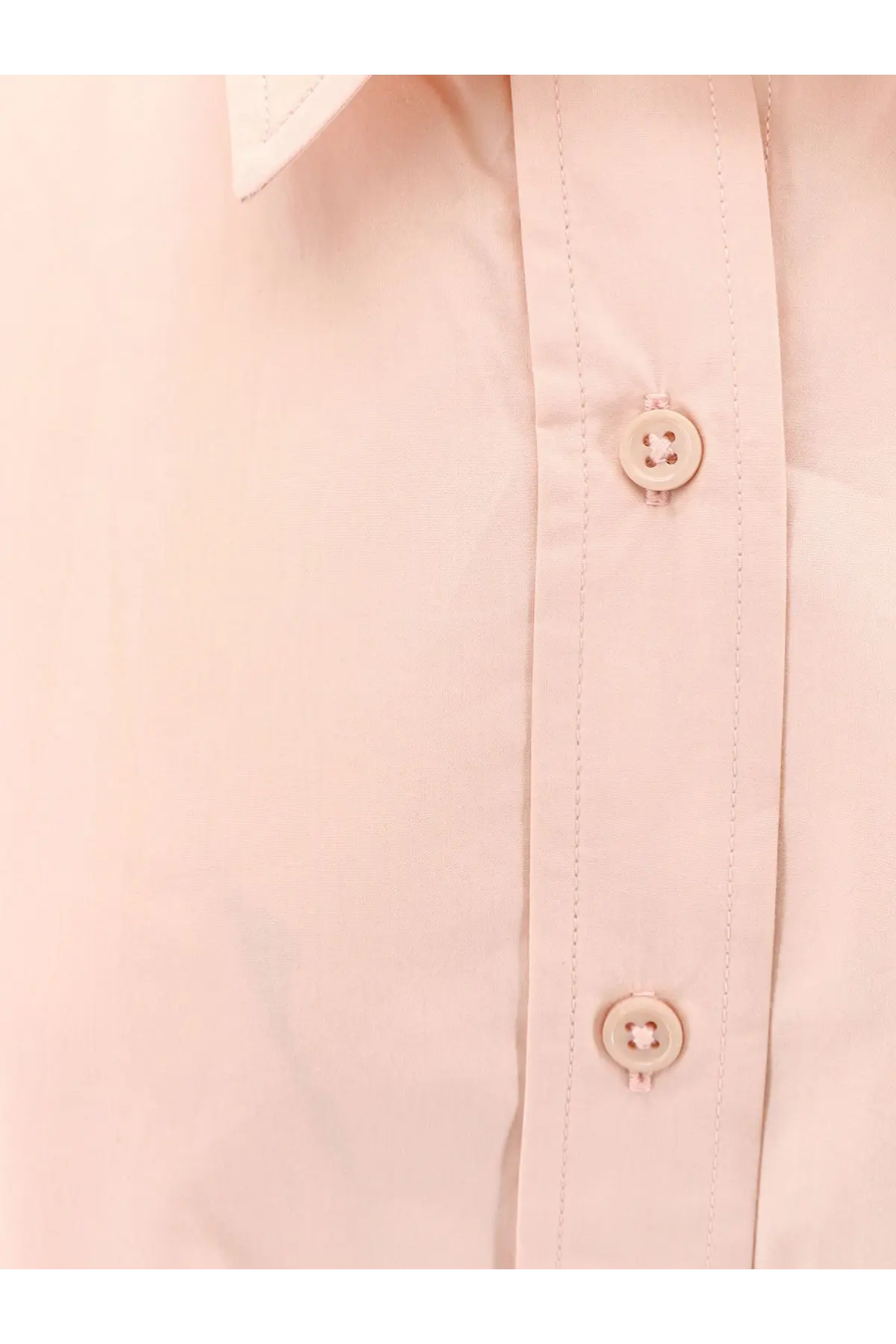 The Frankie Shop women’s Arlen cotton shirt in pale pink features matching buttons and subtle stitching along the placket