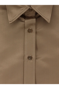 The Frankie Shop women’s Arlen satin boxy shirt in beige features a sleek satin fabric with a crisp collar and matching buttons