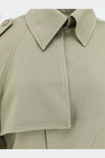 The Frankie Shop women’s elva fluid viscose trench coat in beige with a structured collar and subtle stitching details