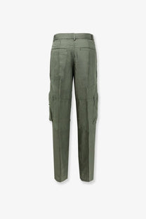 Olive green cargo trousers from the frankie shop featuring multiple pockets and a belted waist for a relaxed fit
