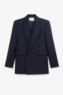 A sleek navy blue double-breasted blazer with a structured silhouette and matching buttons from The Frankie Shop