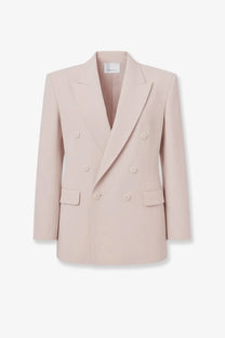 A soft blush pink double-breasted tailored wool blend blazer with classic notched lapels from the frankie shop