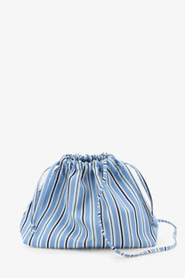 The Frankie Shop women’s Morgan pochette blue drawstring bag with light blue and black vertical stripes and adjustable strap