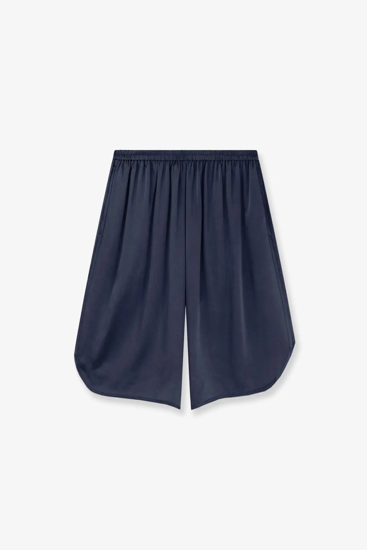 Navy blue silk satin bermuda shorts with elastic waistband and relaxed flowing silhouette from the frankie shop