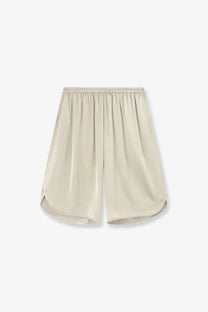 Beige silk nelis satin bermuda shorts from the frankie shop with an elastic waistband and relaxed flowy silhouette