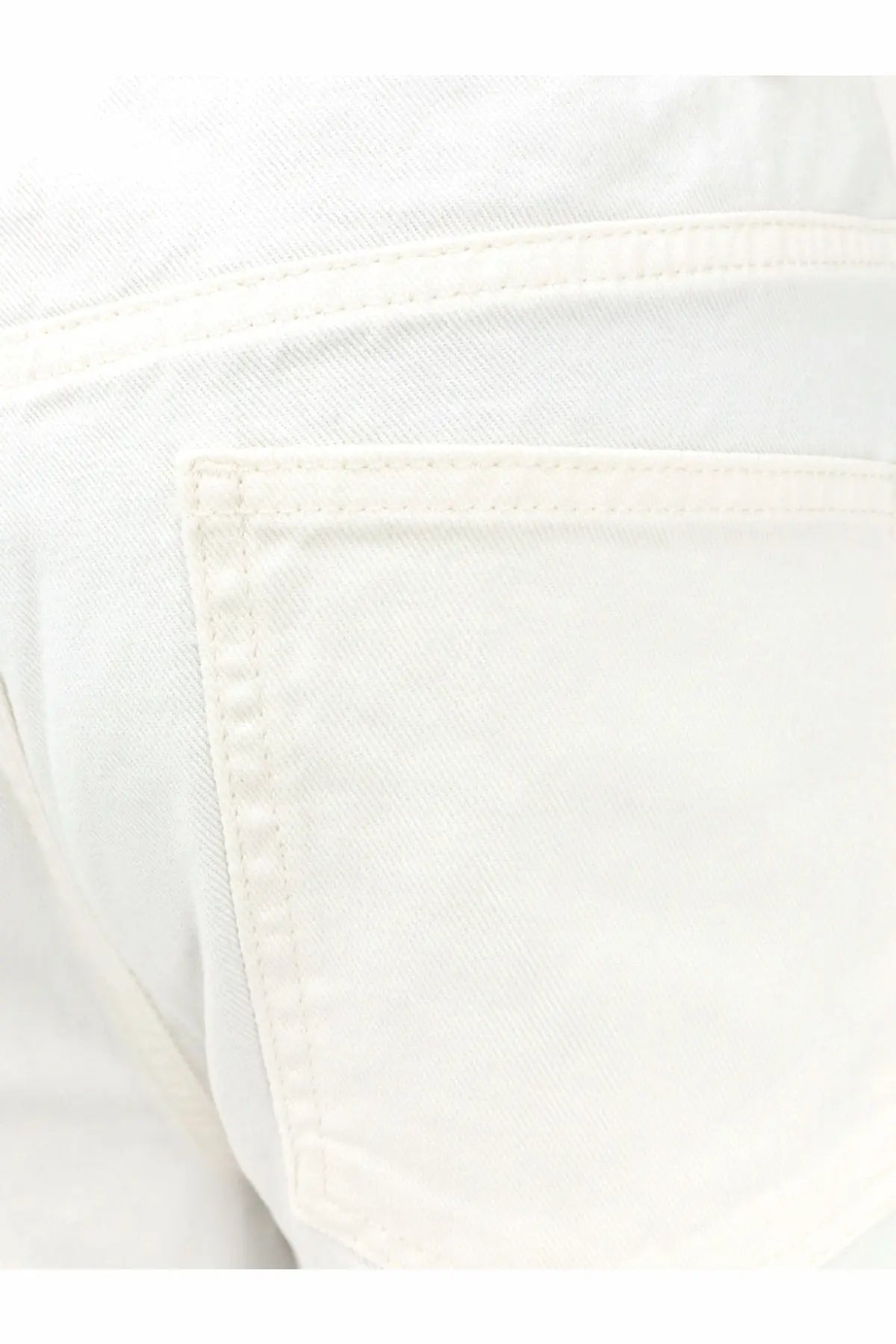 The Frankie Shop women’s nelton denim trousers white back pocket with clean stitching and subtle texture on white denim