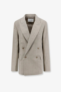Beige double-breasted blazer with subtle textured weave and matching buttons by The Frankie Shop in virgin wool