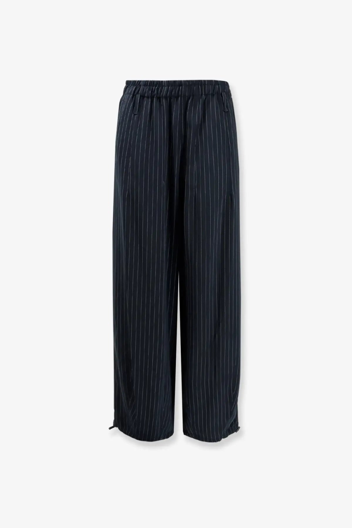 Dark navy pinstripe wide-leg trousers with elastic waistband and drawstring made from recycled material by the frankie shop