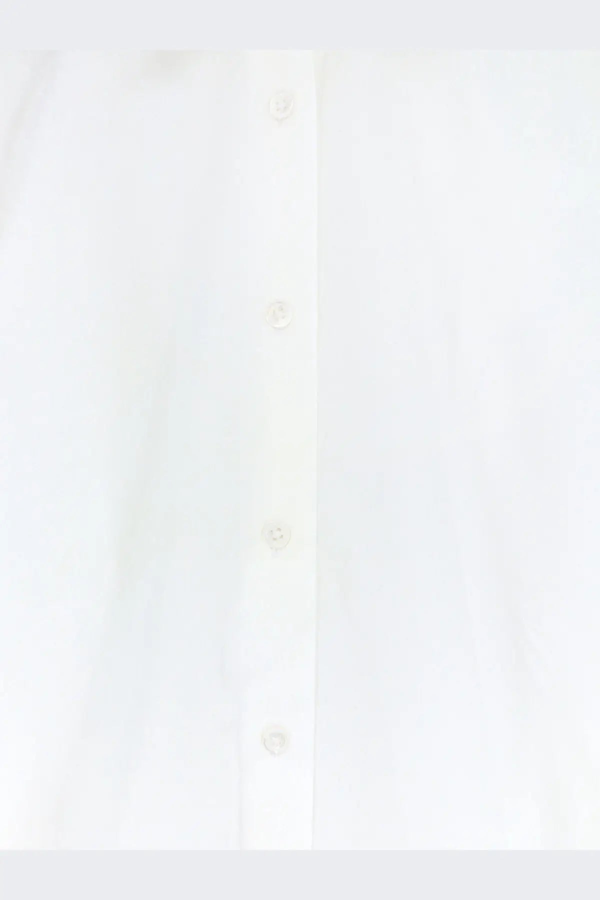 The frankie shop women’s tila organic cotton shirt white featuring a subtle texture and matching buttons down the front