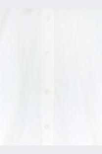 The frankie shop women’s tila organic cotton shirt white featuring a subtle texture and matching buttons down the front