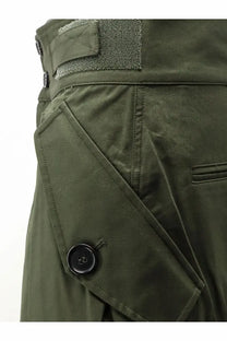 Olive green cotton cargo pants with black button and reinforced fabric detailing from The Frankie Shop women’s collection