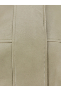 Beige leather strap with neat parallel stitching detail on the green veren faux leather jacket from the frankie shop