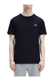 Black fred perry t-shirt with white embroidered laurel wreath logo on left chest in men’s classic blue shirt style