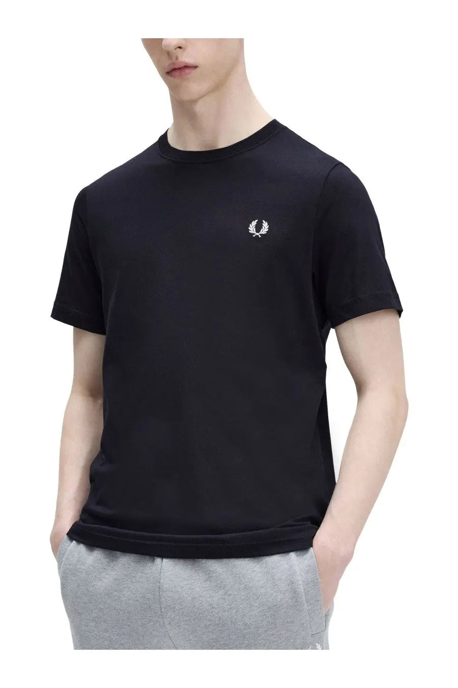 Black fred perry t-shirt with white embroidered laurel wreath logo on left chest for men’s classic blue shirt collection