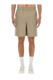 Fred Perry men’s cotton Bermuda shorts in beige with a relaxed fit and elastic waistband made from lightweight fabric
