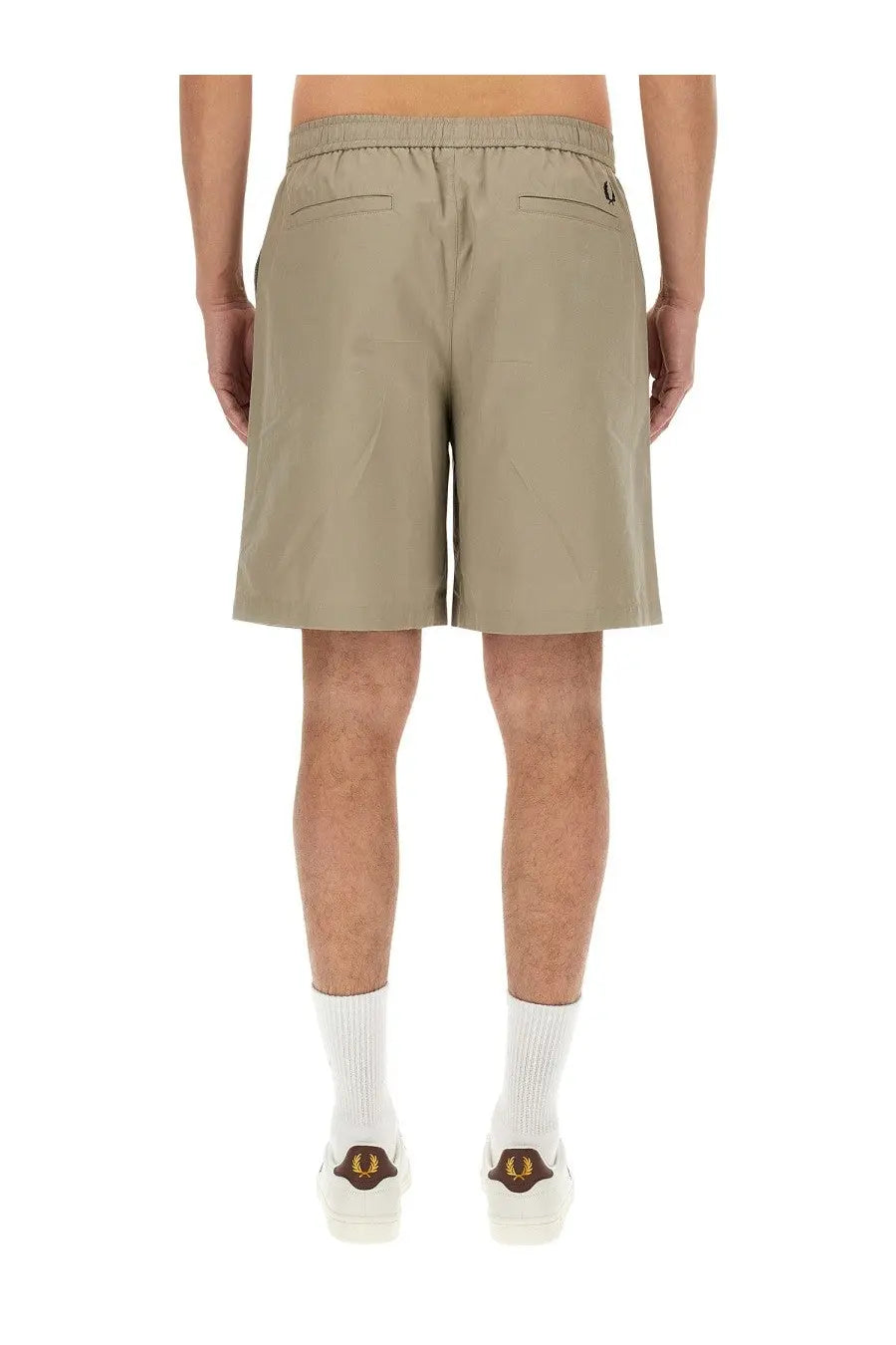 Beige cotton fred perry men’s bermuda shorts with drawstring waistband and logo on the back right pocket